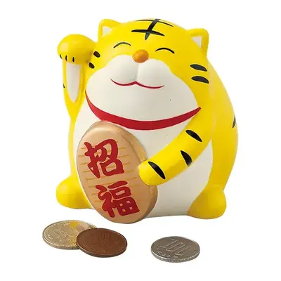 かわいい表情が印象的なトラの貯金箱です。 かわいい表情が印象的なトラの貯金箱です。
