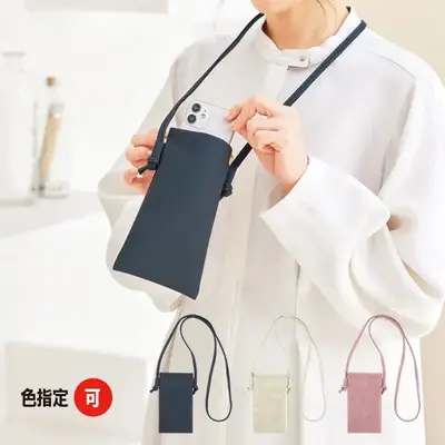 ワンタッチ開閉できるばね口仕様のスマホポーチ。 ワンタッチ開閉できるばね口仕様のスマホポーチ。