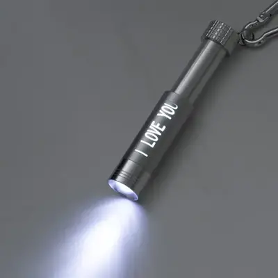 レーザー名入れの場合、LEDを点灯させ本体をスライドすると名入れ部分が光ります。